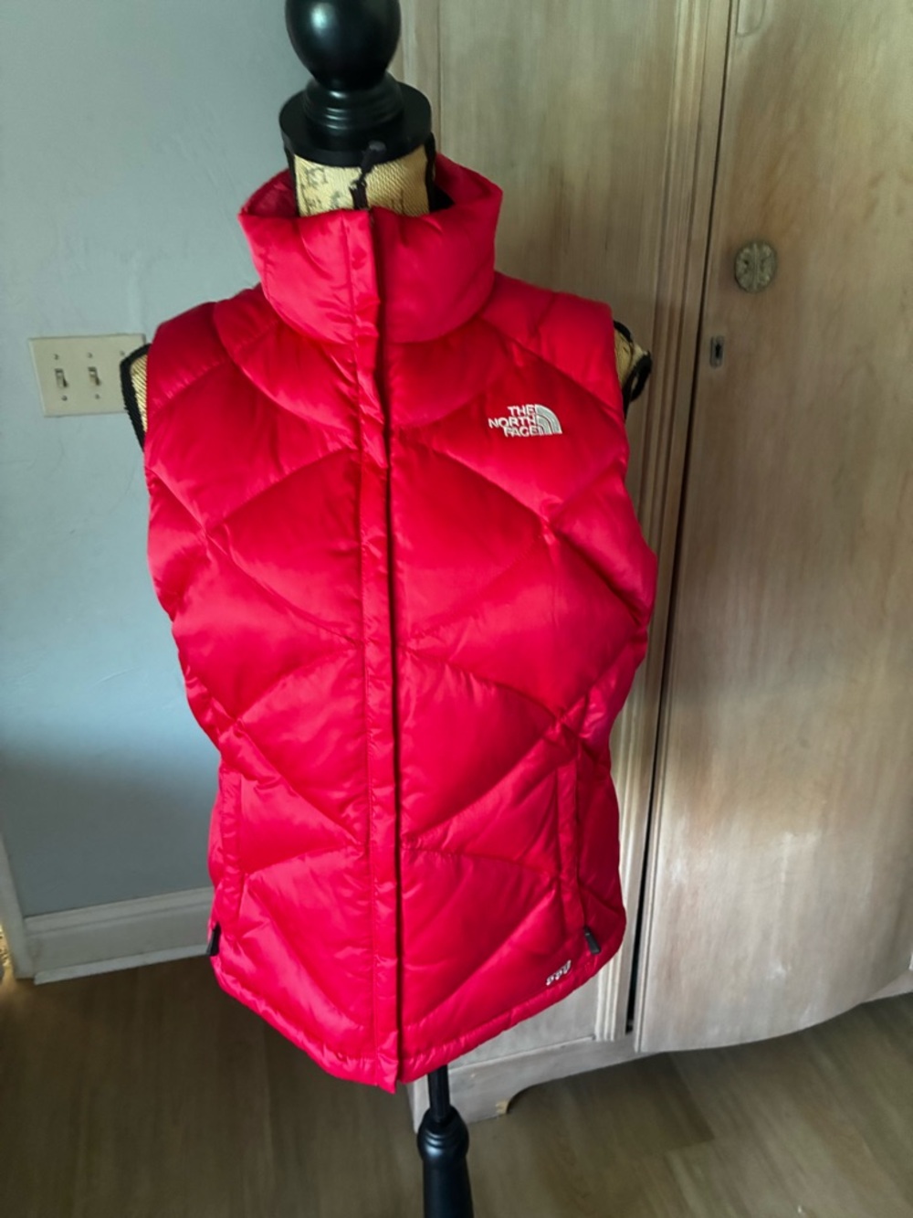 The North Face red puffer 550 vest